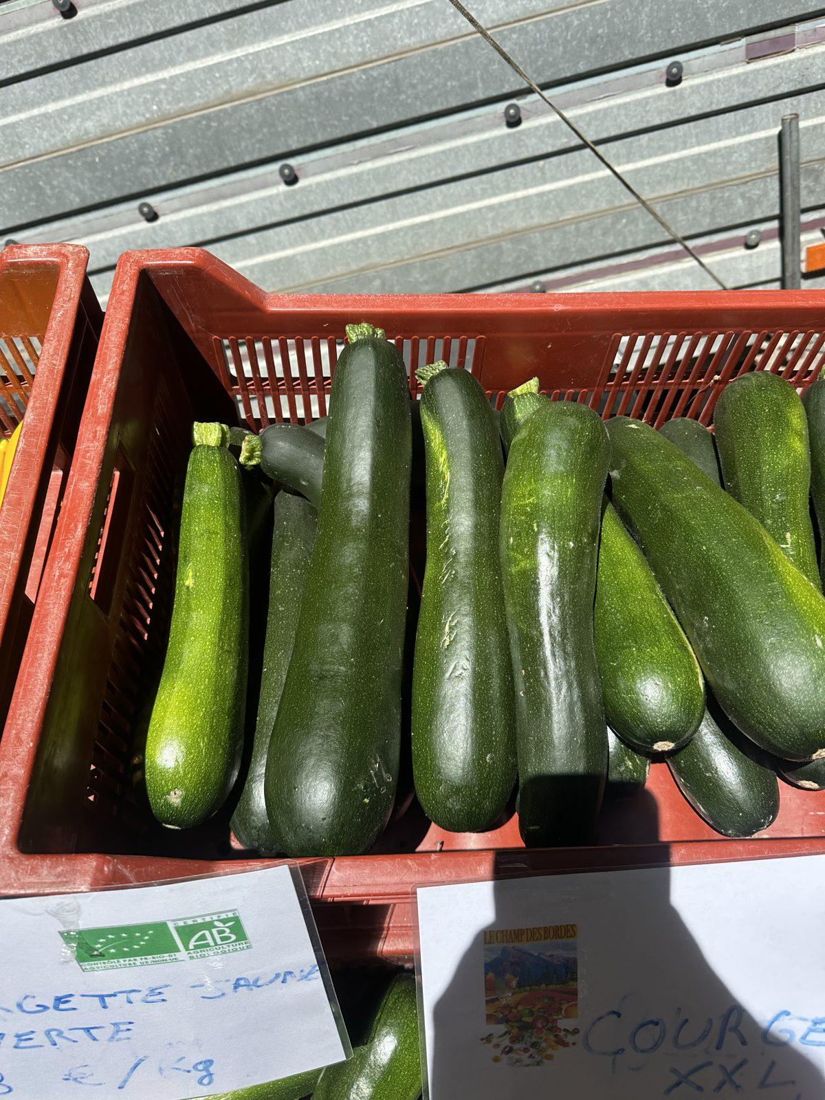 Courgettes in a market crate